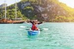 Travel By Boat With A Kayak Stock Photo