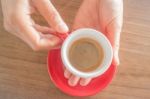 Hands Holding Cup Of Hot Coffee Stock Photo