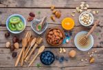 Ingredients For A Healthy Foods Background, Nuts, Honey, Berries Stock Photo