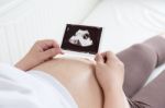 Pregnant Belly With Ultrasound Photo Stock Photo