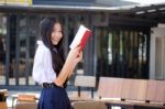 Asia Thai High School Student Uniform Beautiful Girl Read A Book Stock Photo