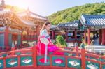 Woman With Hanbok In Gyeongbokgung,the Traditional Korean Dress Stock Photo