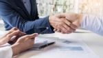 Business Handshake Of Two Men Demonstrating Their Agreement To S Stock Photo