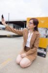 Portrait Of Thai Adult Businesswoman Beautiful Girl Using Her Smart Phone Selfie Stock Photo