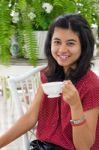 Woman At Home With A Tea From A Cup Stock Photo