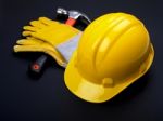 Hard Hat Hammer And Leather Gloves Stock Photo