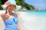 Girl On The Beach At Thailand Stock Photo