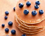 Stack Of Pancakes With Fresh Blueberries Stock Photo