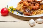 Italian Seafood Spaghetti Pasta On Red Tomato Sauce Stock Photo