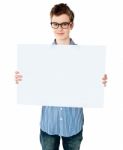 teenage Boy Showing Empty board Stock Photo