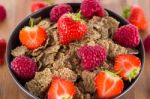 Bran Flakes With Fresh Raspberries And Strawberries Stock Photo