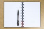 Pen And Blank Opened Notebook Stock Photo