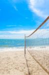 Beach Volleyball Net On The Beach With Blue Sky Stock Photo