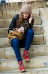 Young Woman Shopping In The City With His Mobile Phone Stock Photo