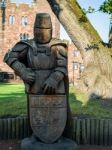 Wooden Knight In The Grounds Of Peckforton Castle Stock Photo