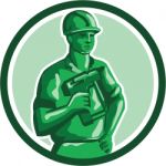 Green Construction Worker Nailgun Circle Retro Stock Photo