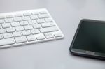 Keyboard And Smart Phone Stock Photo