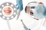 Dentist Preparing Dental Mirror For Working Stock Photo