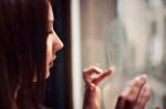 Sensual Girl With Heart On Window Stock Photo