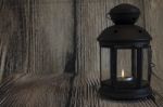 Black Lamp On Wooden Background	 Stock Photo