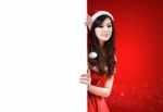 Pretty Women In Santa Outfit Stock Photo