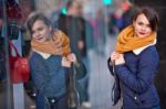 Pretty Young Girl Standing At Shopfront Stock Photo