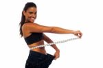 Slim Woman Measuring Her Waist Stock Photo