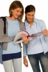 Girl Students Reading Book Stock Photo