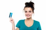 Young Lady Holding Credit Card Stock Photo