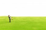 Miniature Couple Hugging On Green Fields Stock Photo