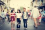 Blurred People Walking On The Street Of Old Town Stock Photo