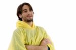 Portrait Of Smiling Male With Raincoat Stock Photo