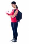 Girl Holding Clipboard Stock Photo