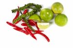 Chili Peppercorn And Lime Stock Photo