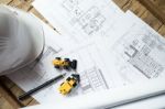 Blueprints, Hardhat Or Safty Helmet, Pen In Architecture Office Stock Photo