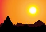 Sunset And Mountains In Silhouette Stock Photo