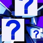 Question Mark On Cubes Shows Uncertainty Stock Photo