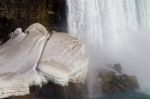 The Waterfall, Snow And Rocks Stock Photo