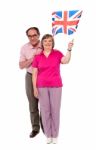 Senior Couple Holding UK Flag Stock Photo