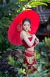 Thai Woman In Traditional Costume Stock Photo