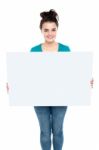 Young Lady Holding Blank Board Stock Photo