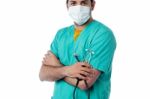 Young Male Doctor Wearing Face Mask Stock Photo