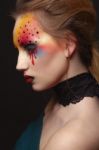 Young Female Model With Bloody Eyes Makeup Stock Photo