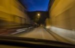 Car In Narrow Street Stock Photo