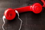 Old Landline Headphones Listening Through A Modern White Headpho Stock Photo