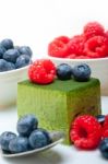 Green Tea Matcha Mousse Cake With Berries Stock Photo