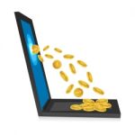 Laptop With Dollar Coins Stock Photo