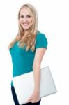 Pretty Woman Posing With Laptop Stock Photo