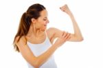 Woman Checking Muscles Stock Photo