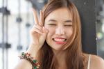 Portrait Of Thai Adult Beautiful Girl Relax And Smile Stock Photo